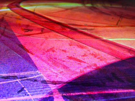 Contemporary stained glass detail showing layered color and movement, architectural glass for church interior