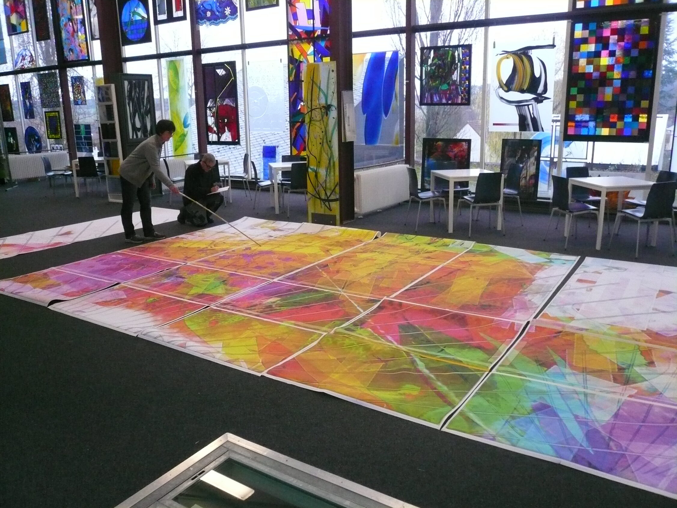 Discussing 1 to 1 prints in the Derix Gallery for the Aurora Central Project