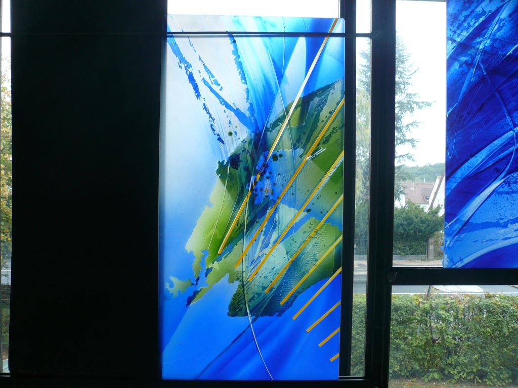 Viewing a sample test of color glass for the Aurora Central Recreation Center exterior window