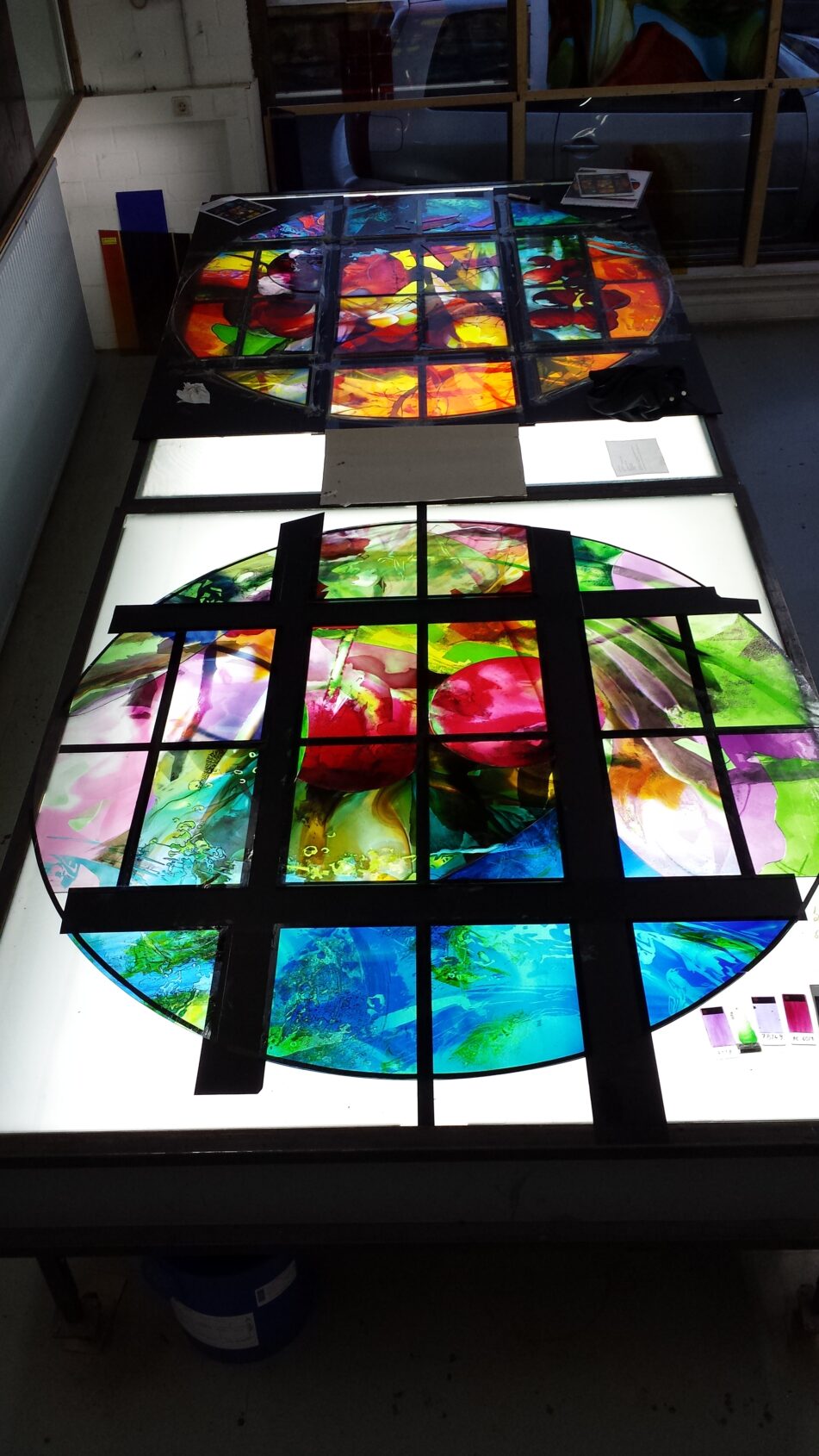 The Spring and Summer windows being painted on the light table