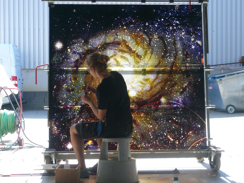 The beautiful stained glass from Our Lady of the Angels with painted galaxy imagery