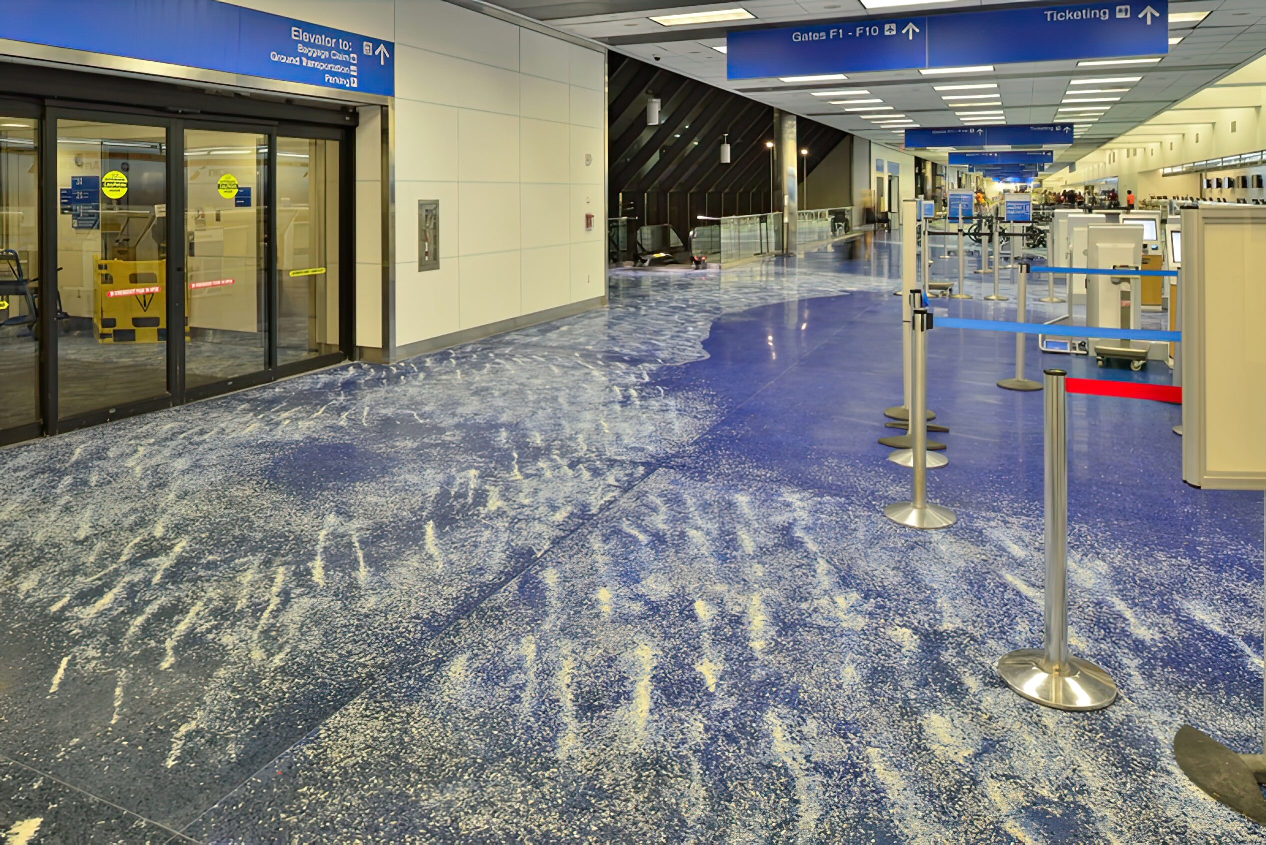 Example of seeding mother of pearl and glass aggregates to create an ocean waves and foam in an artistic epoxy terrazzo floor