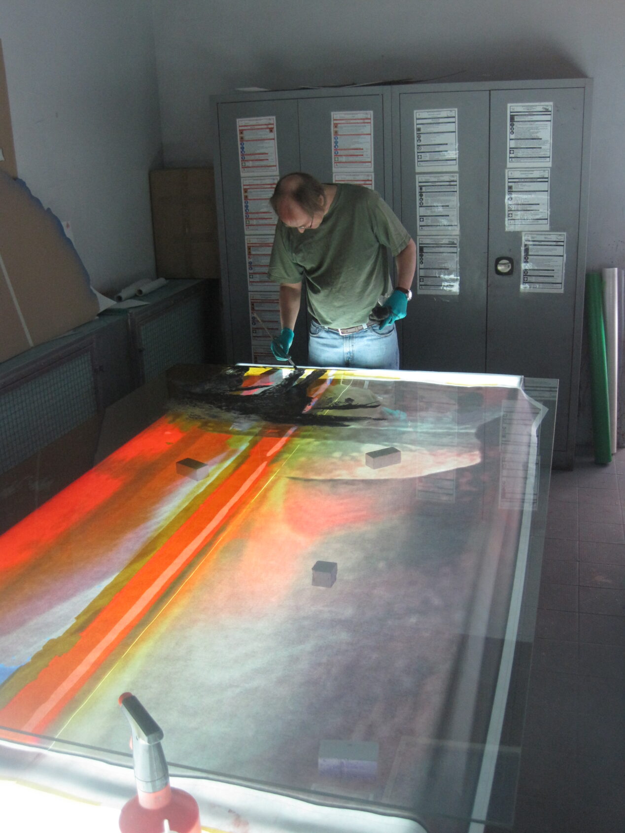 The painting of the lamb window for Gloria Dei at Derix Glasstudios by Scott Parsons