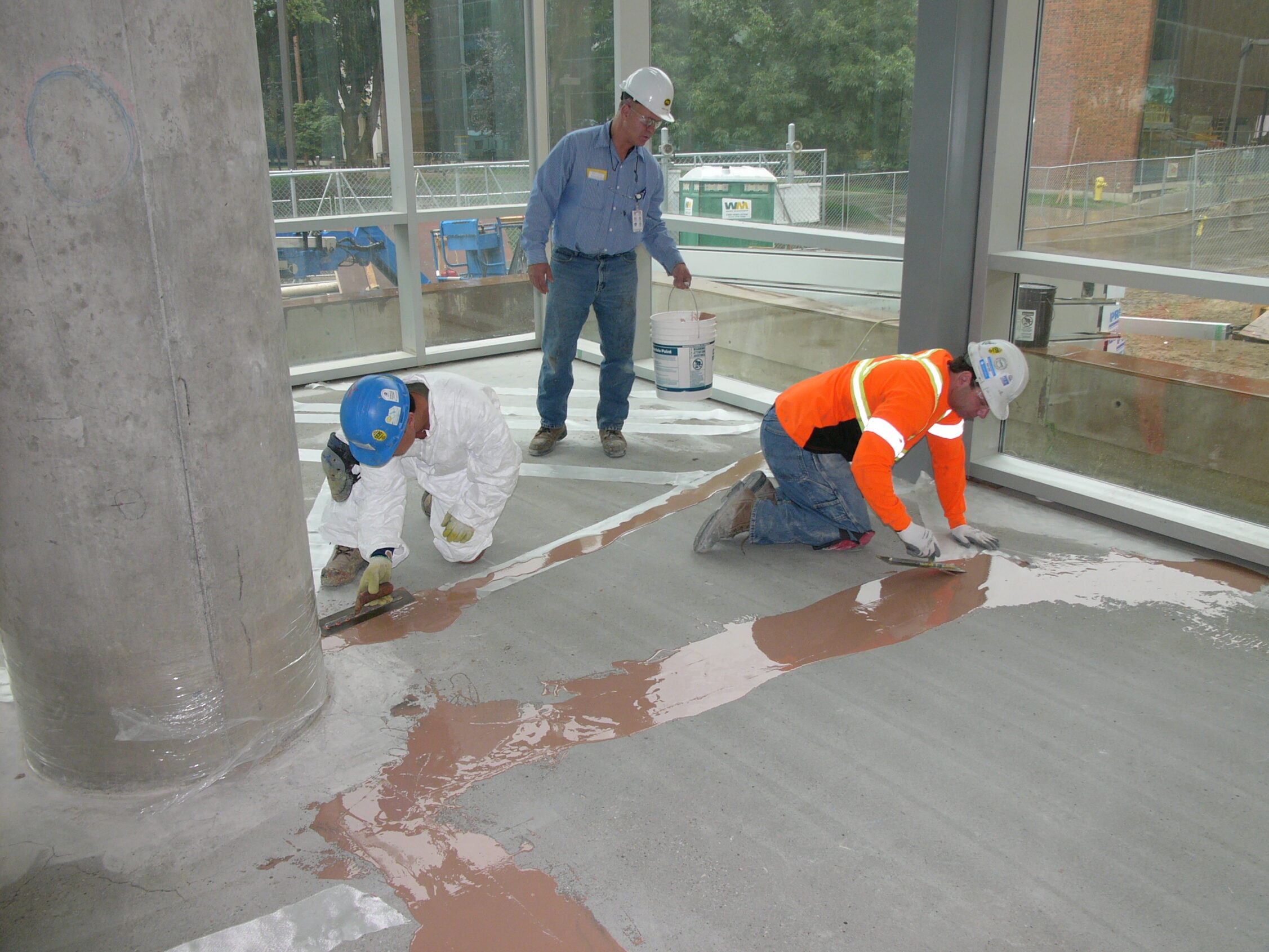 Repairing cracks in the subfloor prior to pouring the terrazzo floor