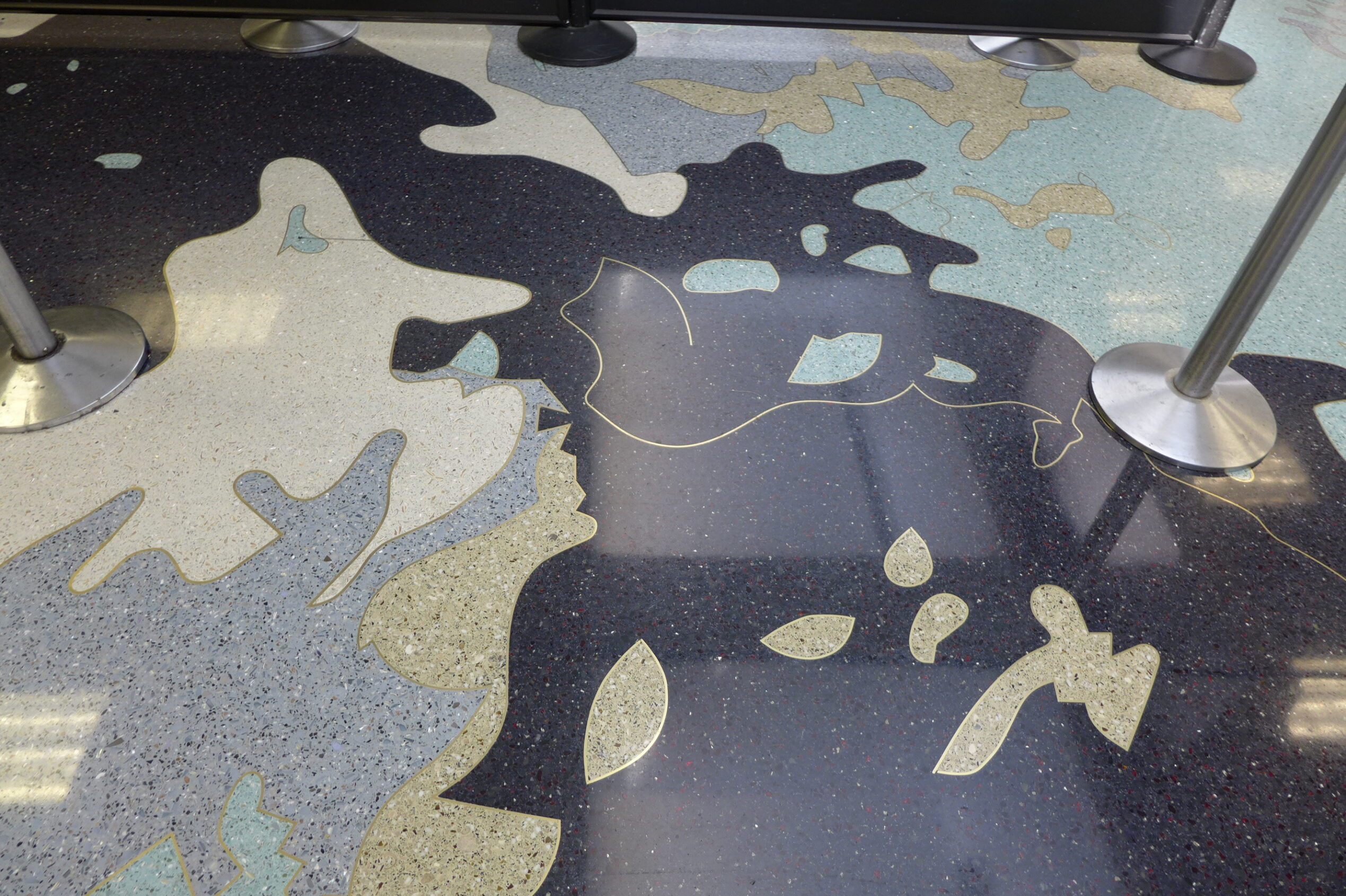 Finished details of an ancient map embedded into the terminal floor at the Fort Lauderdale-Hollywood International Airport