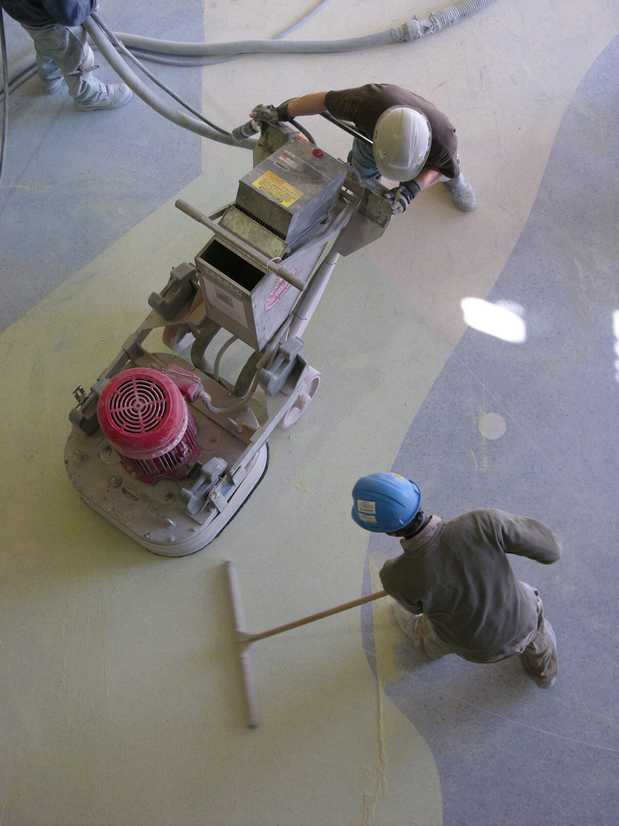 Grinding an artistic epoxy terrazzo floor with diamonds